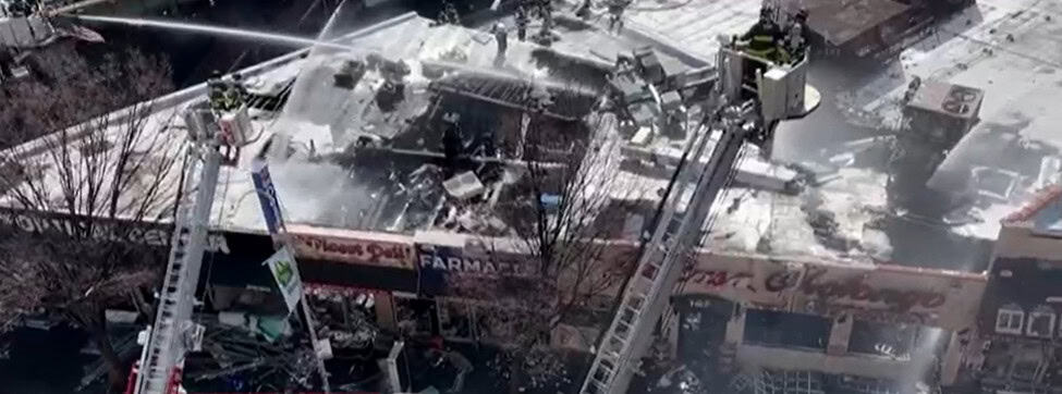 rescuers responded to a sizeable four-alarm fire that sent six Bronx businesses up in flames at a strip mall in University Heights.